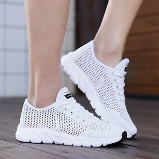 Women Mesh Sneakers – Lightweight Breathable Casual Shoes in white, featuring breathable mesh and non-slip sole for comfort.