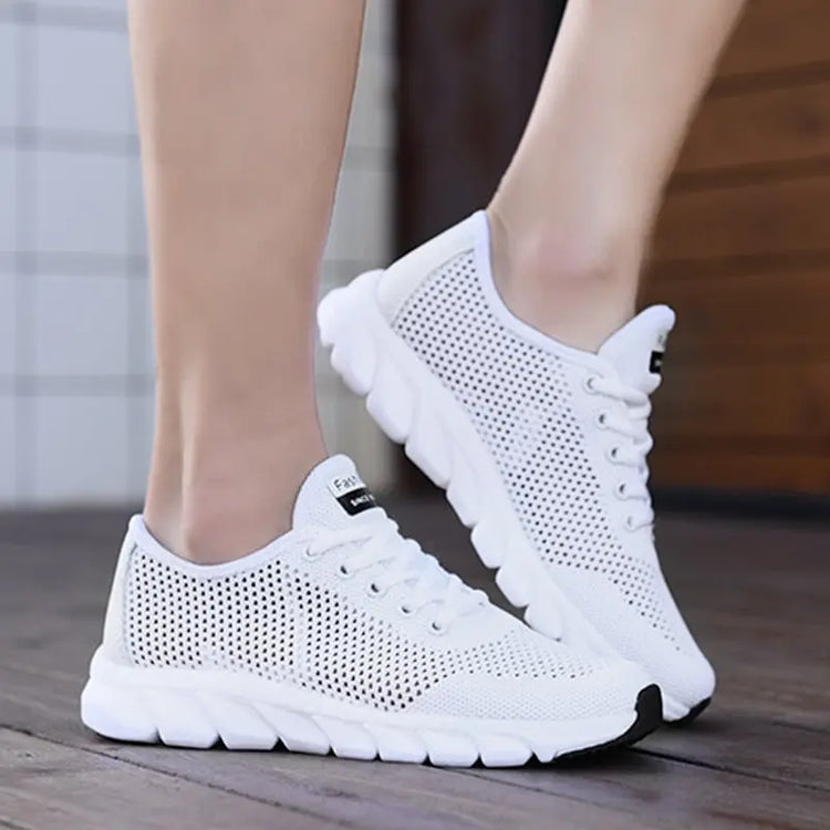 Women Mesh Sneakers – Lightweight Breathable Casual Shoes in white, featuring breathable mesh and non-slip sole for comfort.