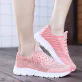 Women Mesh Sneakers – Lightweight Breathable Casual Shoes in pink with mesh design and non-slip sole.