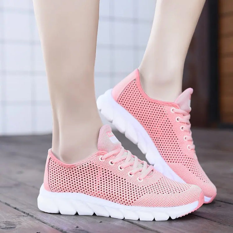 Women Mesh Sneakers – Lightweight Breathable Casual Shoes in pink with mesh design and non-slip sole.