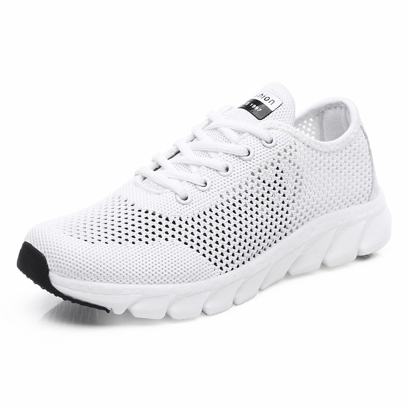 Women Mesh Sneakers – Lightweight Breathable Casual Shoes in white color with mesh fabric and non-slip sole.